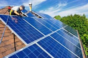 Home Solar Power Panels Being Installed On A Roof - iStockPhoto