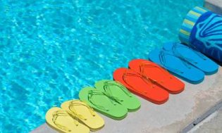 Solar Power For Homes Can Heat Swimming Pools - iStockPhoto