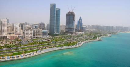 Hydrogen Power Abu Dhabi With View Of Abu Dhabi Corniche - iStockPhoto