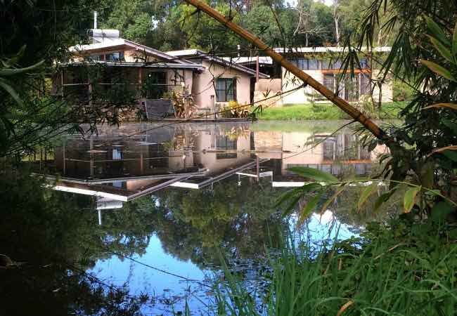 Permaculture activist Geoff Lawton's natural building materials home by Paradise Pond on Zaytuna Farm, NSW, Australia