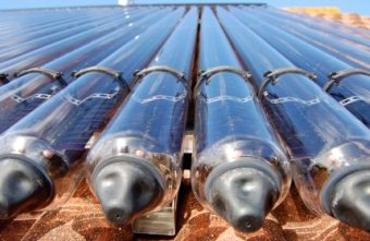 Solar Thermal Energy Utilised By Roof Collecting Tubes - iStockPhoto