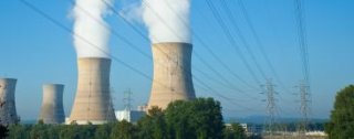 Three Mile Island With Damaged Cooling Towers In Background - iStockPhoto