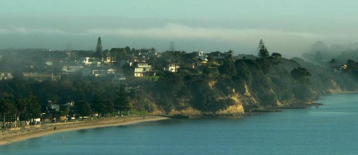 Early morning haze over Eastern Beach, Auckland, New Zealand which limits regular solar thermal collection 