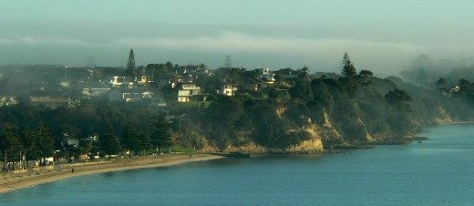 Early morning haze over Eastern Beach, Auckland, New Zealand which limits regular solar thermal collection 